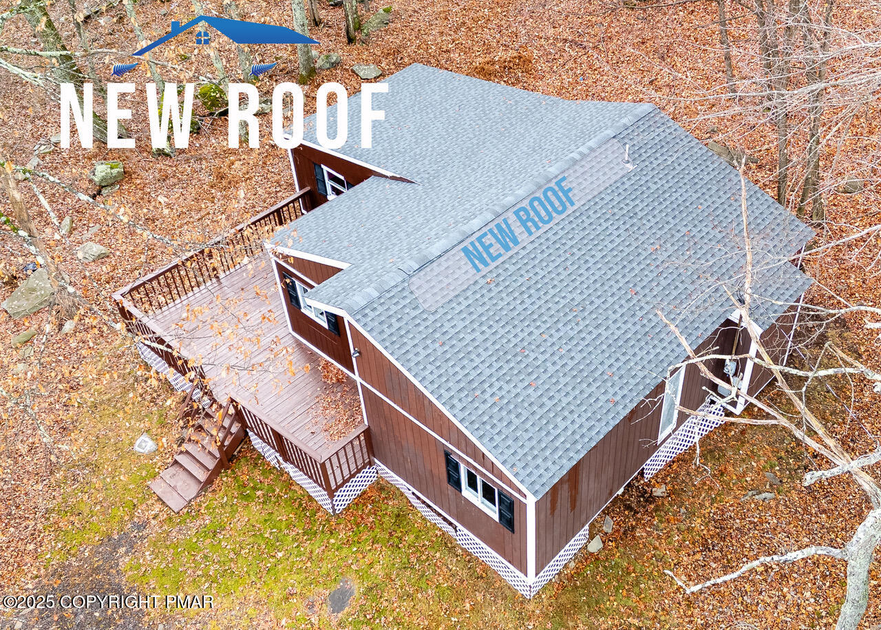 a view of a house with a roof deck