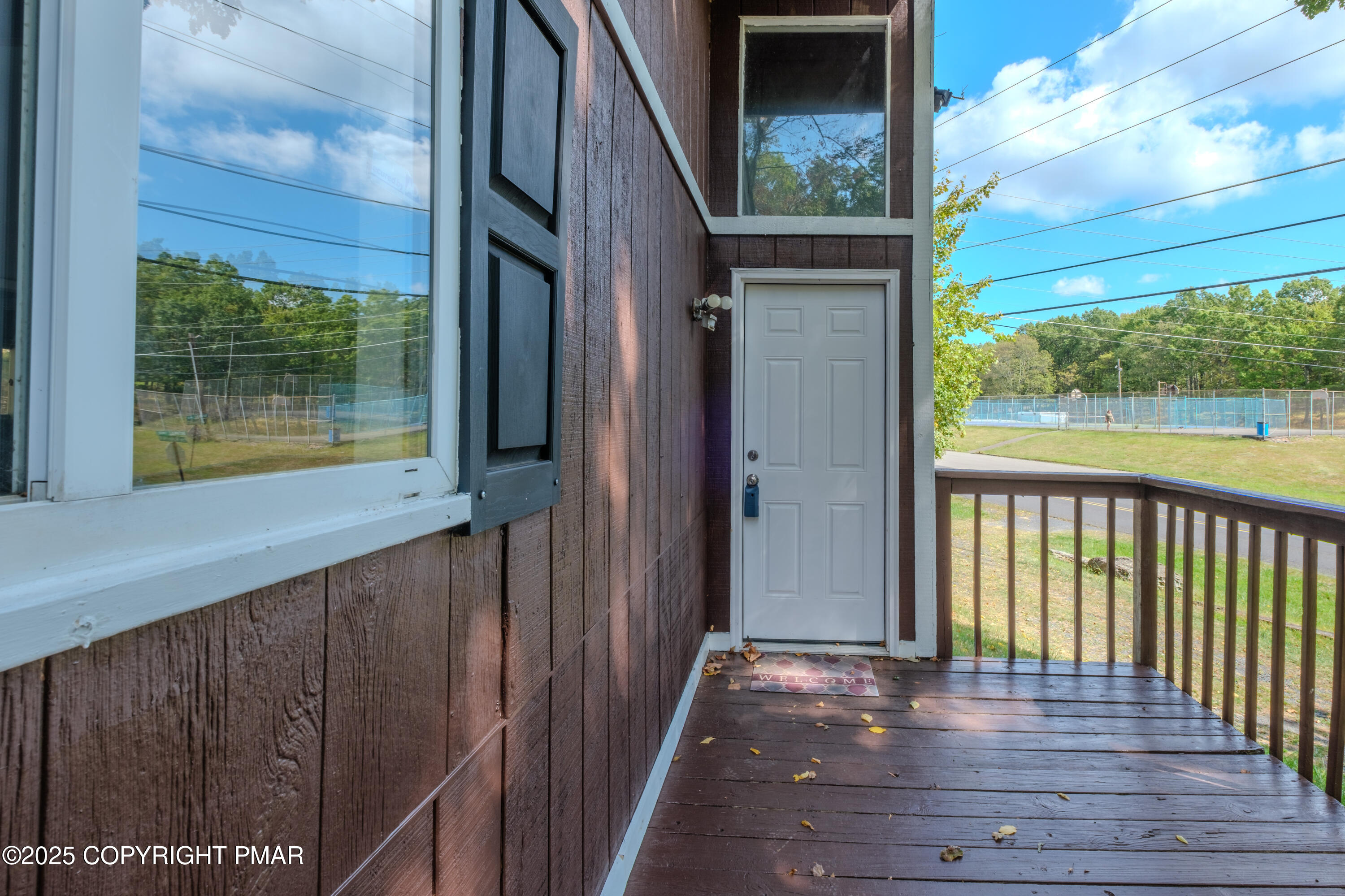 4774 Pine Ridge Drive West Bushkill, PA 18324 - Photo 16 of 36 a view of a house with a balcony