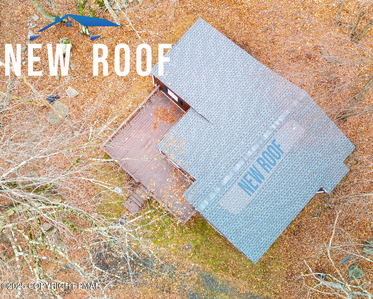 4774 Pine Ridge Drive West Bushkill, PA 18324 - Photo 3 of 36 a view of wooden fence