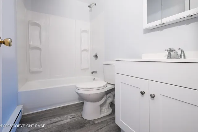 a view of balcony with wooden floor