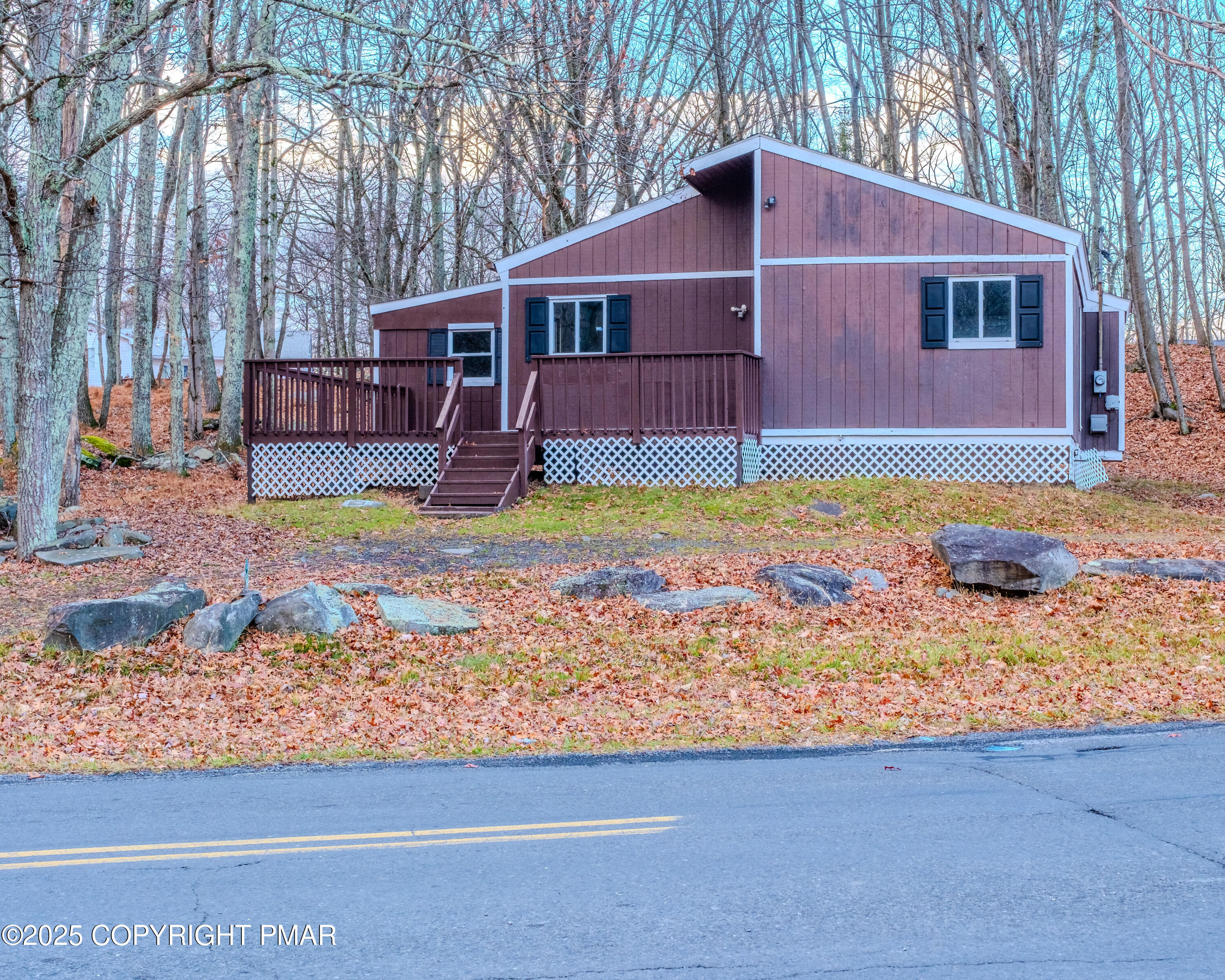 4774 Pine Ridge Drive West Bushkill, PA 18324 - Photo 9 of 36 a view of a house with backyard