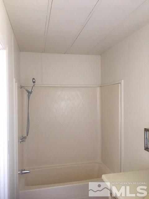 17835 Jaeger Court Reno, NV 89508 - Photo 3 of 5 a bathroom with a shower