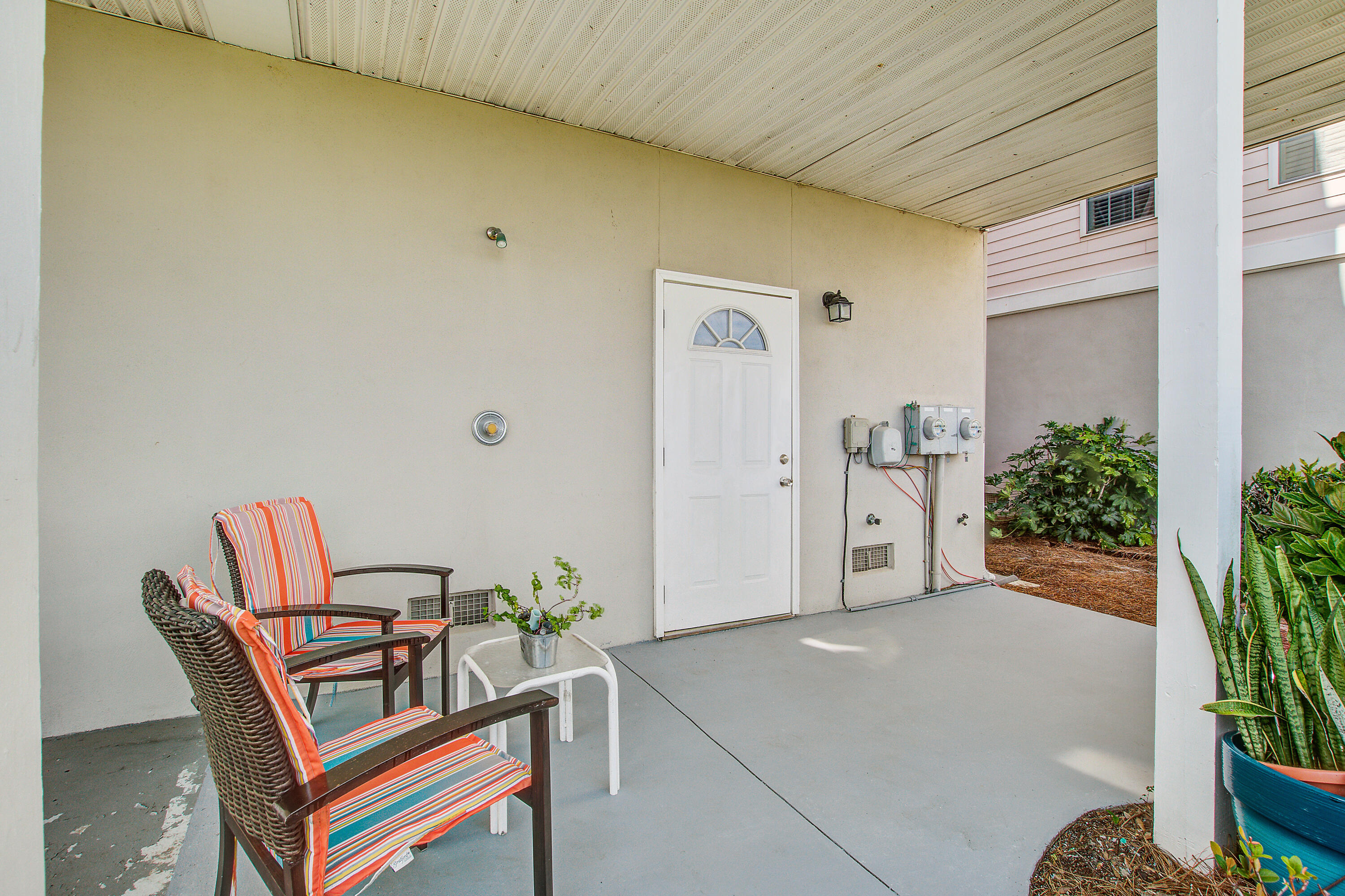90 West 2nd Street Folly Beach, SC 29439 - Photo 36 of 39 Downstairs Covered Seating Area