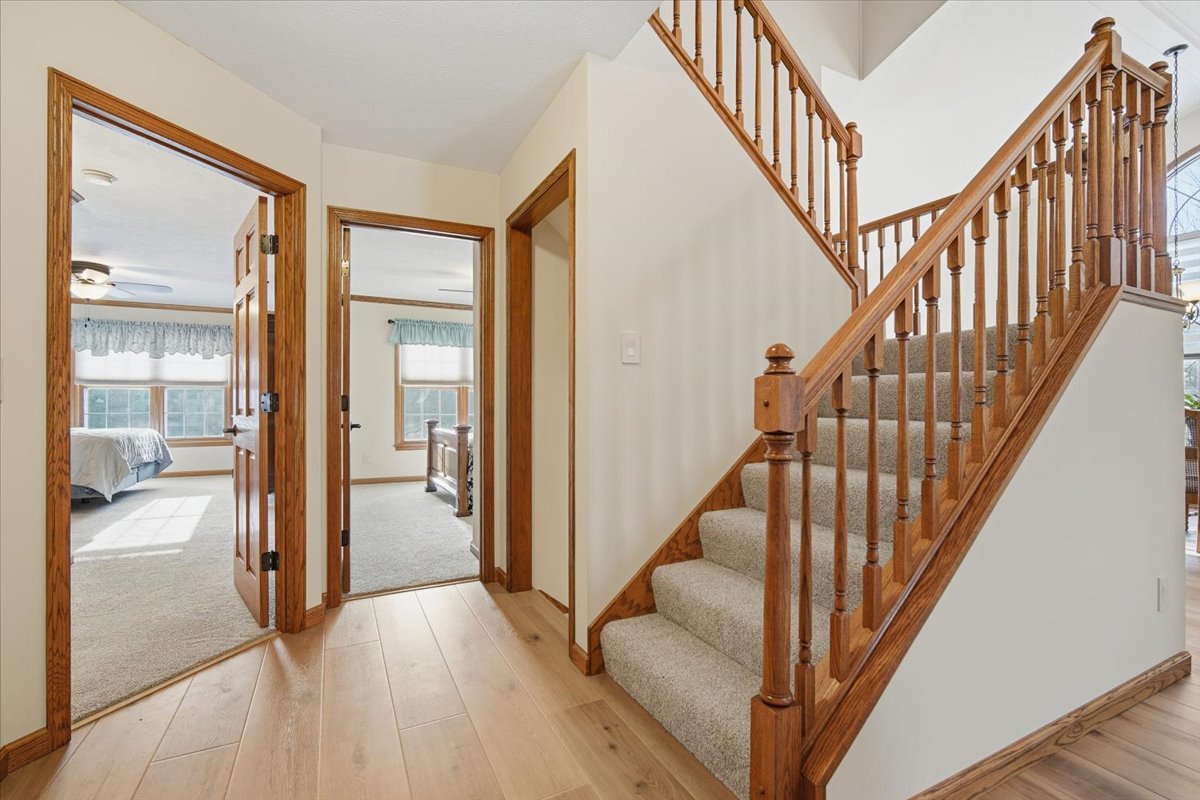 9 Spruce Court Bloomington, IL 61704 - Photo 18 of 42 a view of an entryway with wooden floor