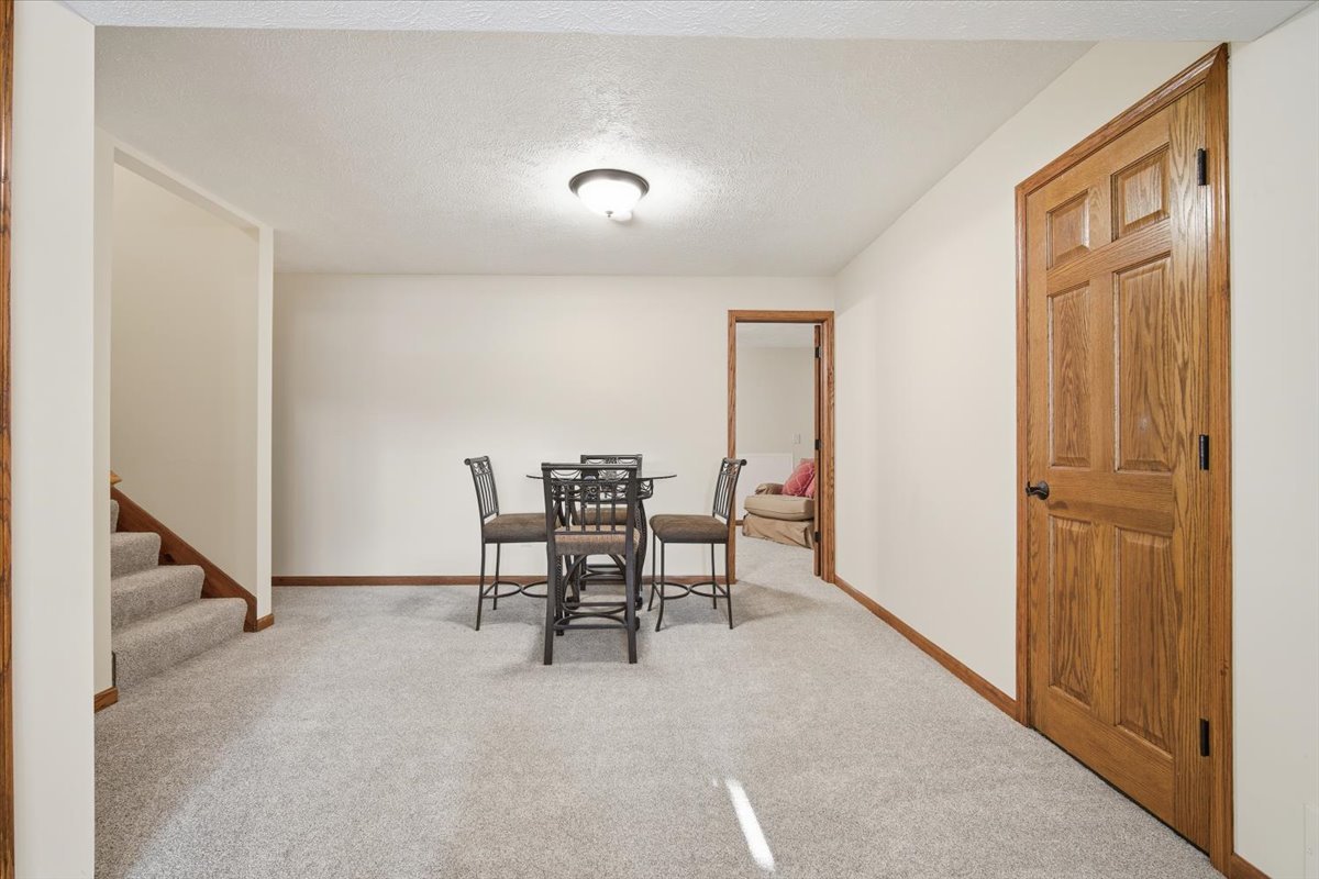 9 Spruce Court Bloomington, IL 61704 - Photo 28 of 42 a view of a livingroom with furniture and a window