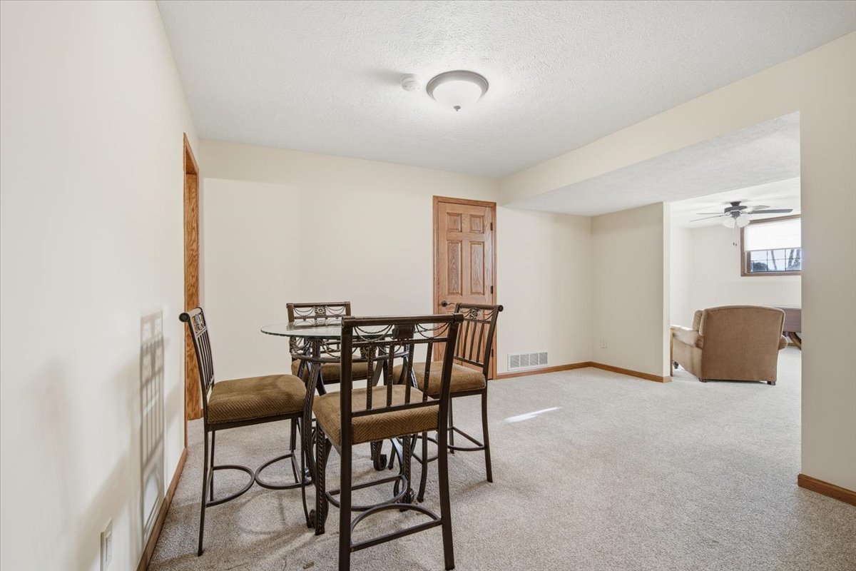 9 Spruce Court Bloomington, IL 61704 - Photo 29 of 42 a view of a livingroom with furniture and a window