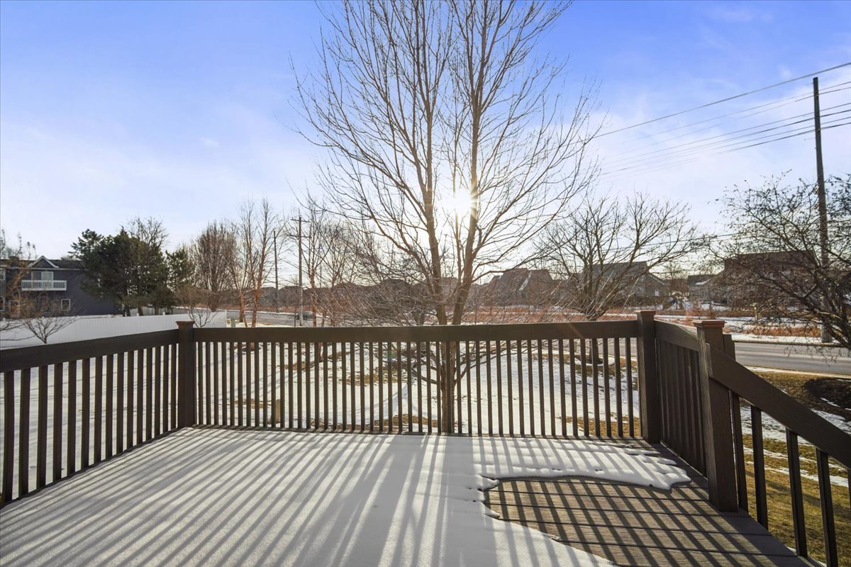 9 Spruce Court Bloomington, IL 61704 - Photo 39 of 42 a view of a wooden roof deck