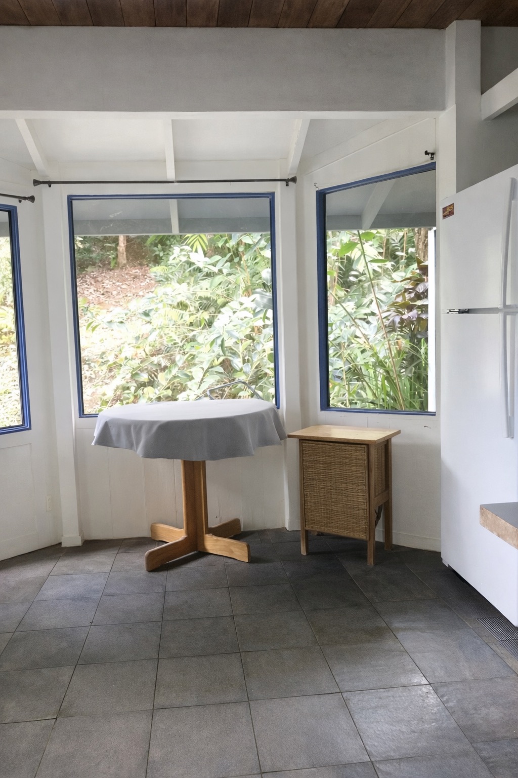 6380 Kalama Road Kapaa, HI 96746 - Photo 5 of 7 a room with a large window and a rug