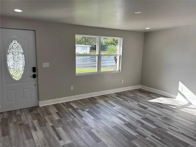 an empty room with window