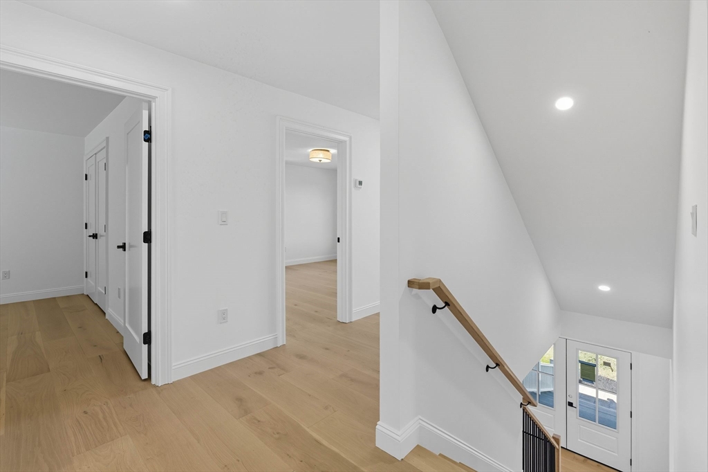 161 Bridge Street Hamilton, MA 01982 - Photo 23 of 42 a view of a hallway with staircase