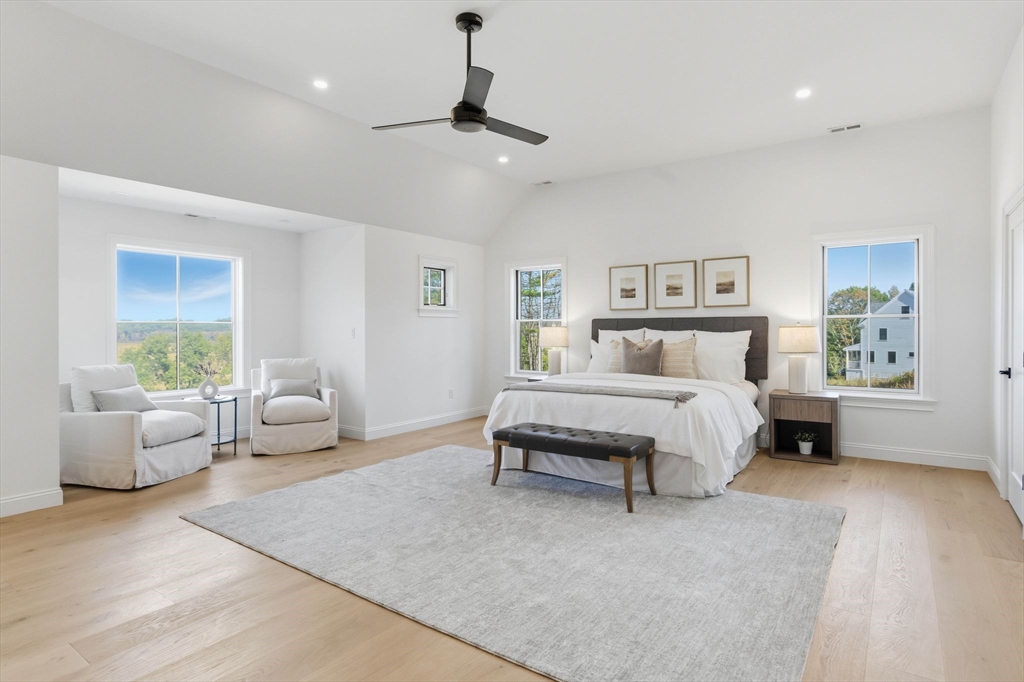 161 Bridge Street Hamilton, MA 01982 - Photo 24 of 42 a bedroom with a large bed and furniture