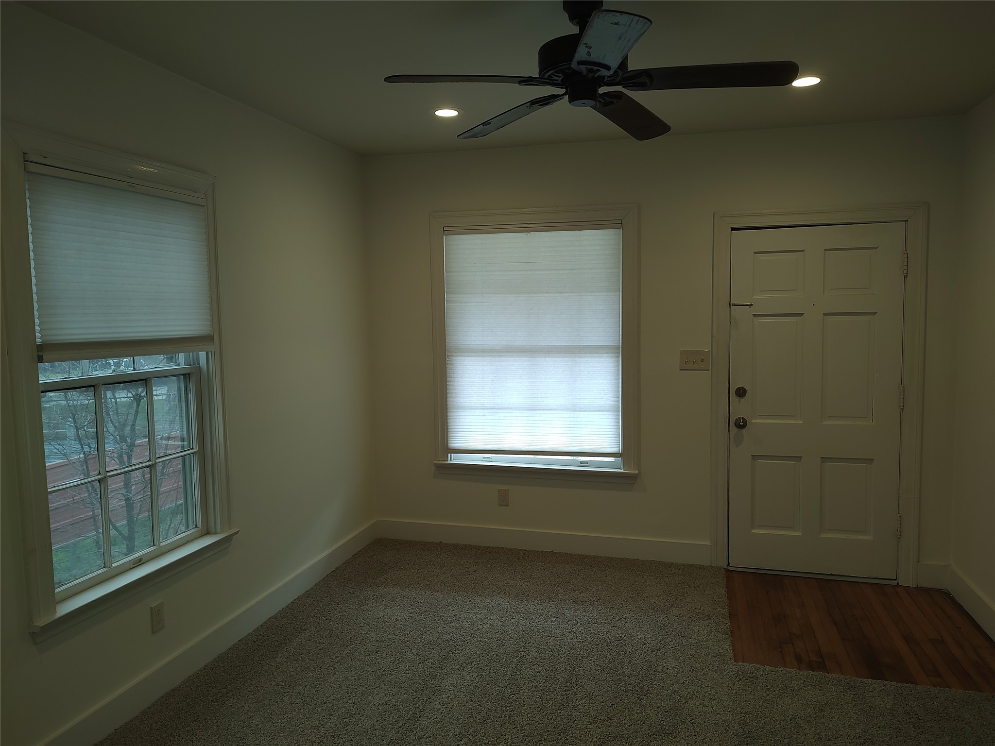 2102 Yellow Jacket Lane, Unit A Austin, TX 78741 - Photo 4 of 15 Entryway featuring ceiling fan, dark carpet, and recessed lighting