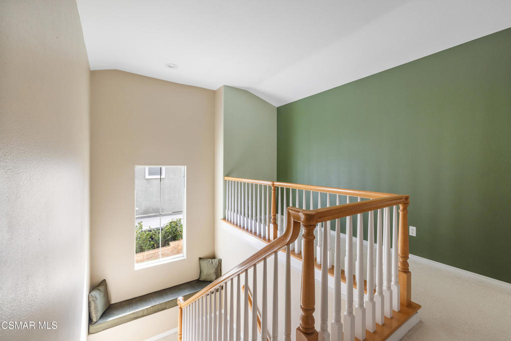 4920 Corral Street Simi Valley, CA 93063 - Photo 26 of 54 a view of staircase with wooden floor and a window