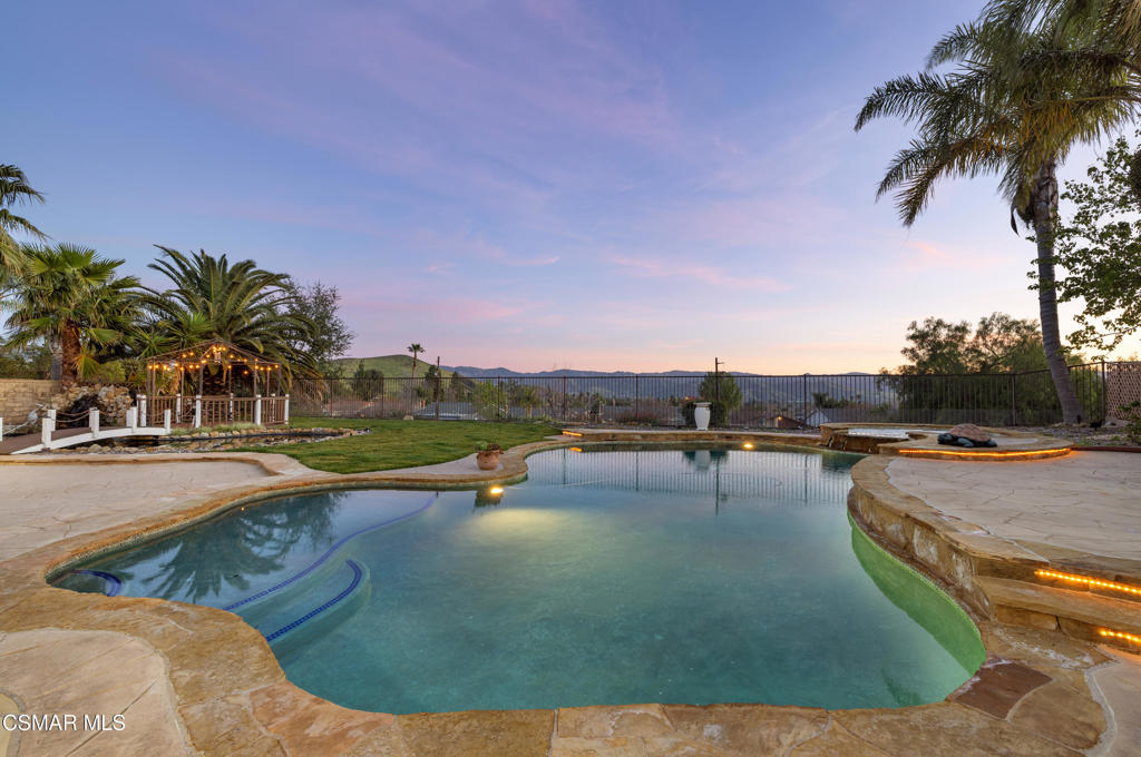 4920 Corral Street Simi Valley, CA 93063 - Photo 31 of 54 a view of a swimming pool with a lounge chair