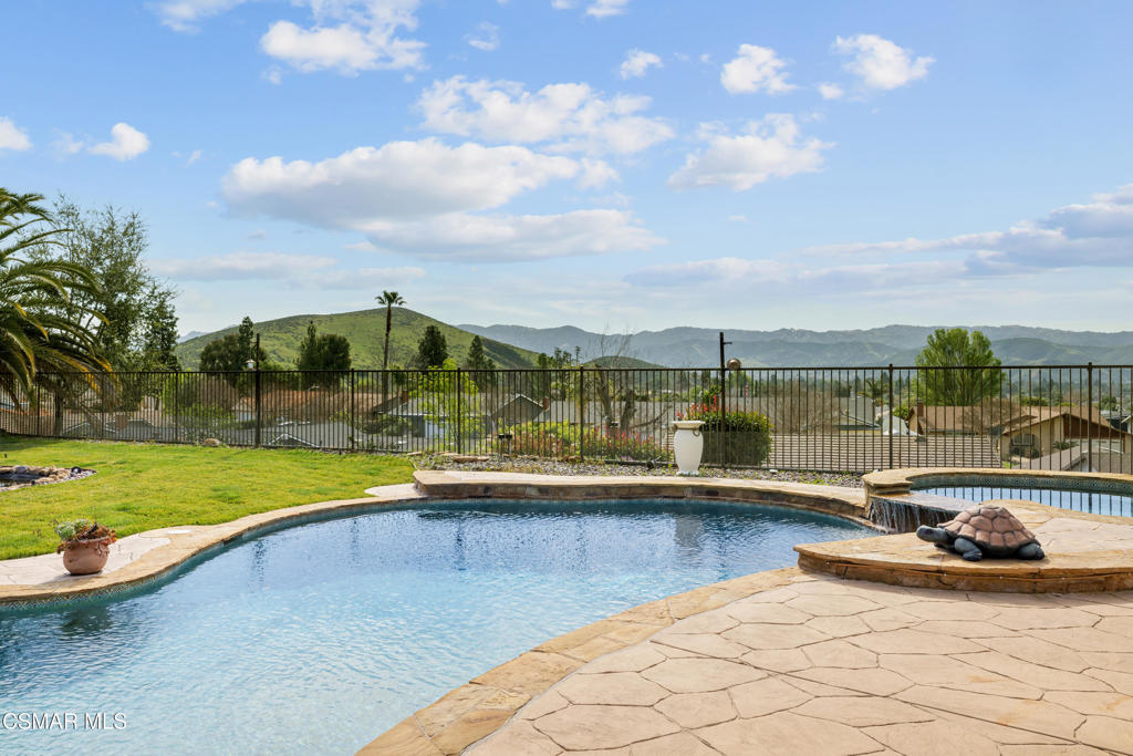 4920 Corral Street Simi Valley, CA 93063 - Photo 34 of 54 a view of swimming pool with a patio and a garden