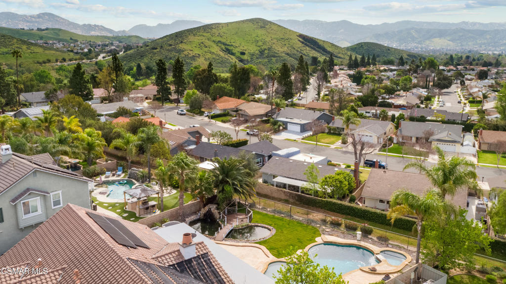 4920 Corral Street Simi Valley, CA 93063 - Photo 38 of 54 a view of a lake with mountains in the background