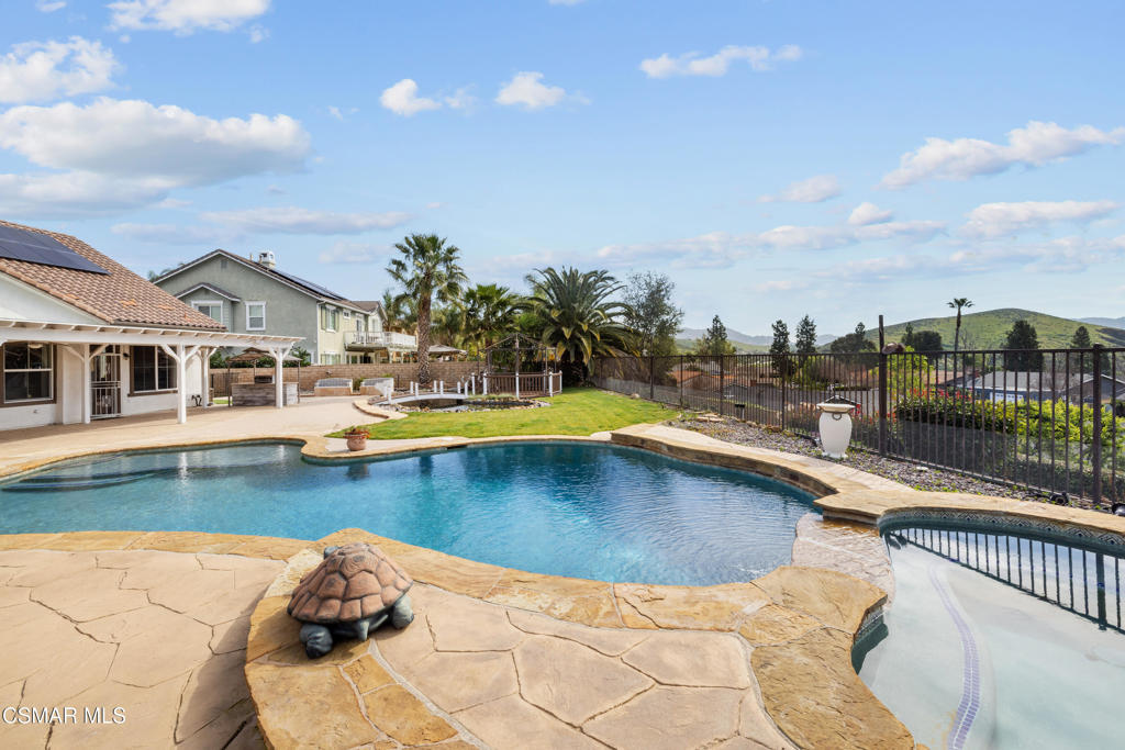 4920 Corral Street Simi Valley, CA 93063 - Photo 39 of 54 a view of a swimming pool and a terrace