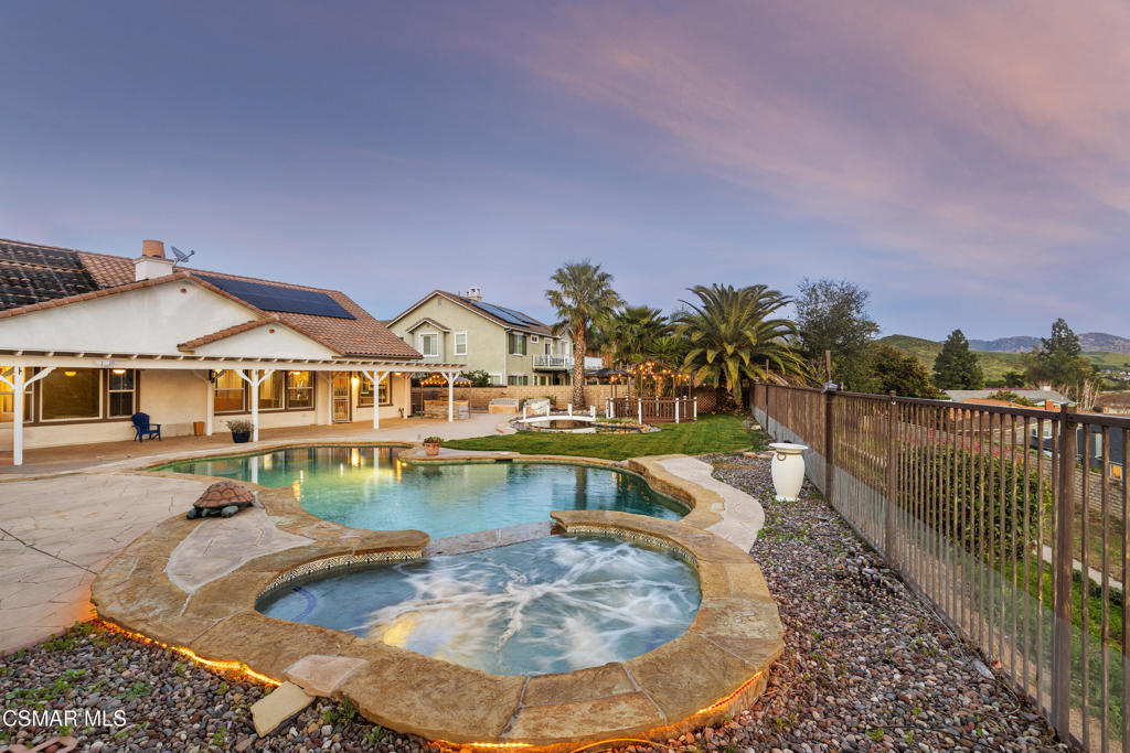 4920 Corral Street Simi Valley, CA 93063 - Photo 40 of 54 a view of a house with pool and lake view