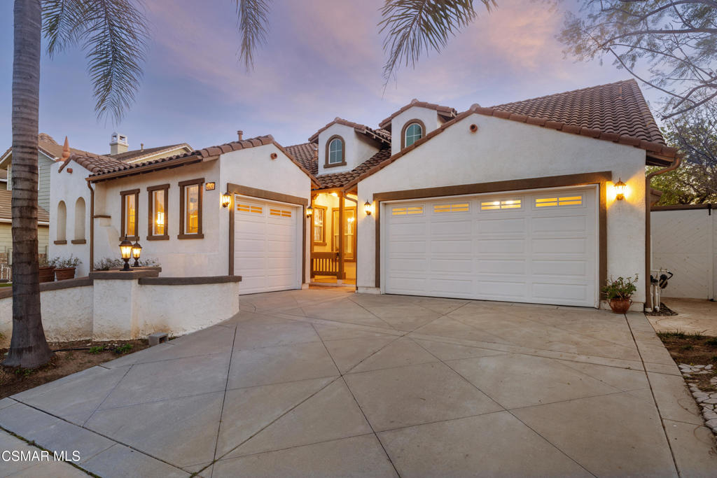 4920 Corral Street Simi Valley, CA 93063 - Photo 4 of 54 a view of a parking space in front of a house