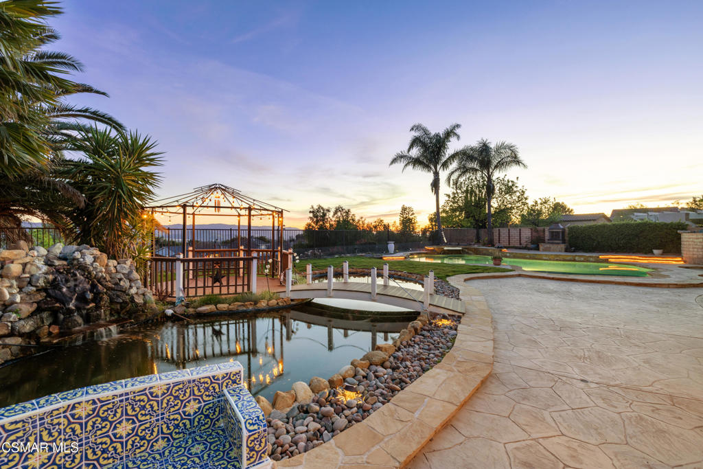 4920 Corral Street Simi Valley, CA 93063 - Photo 47 of 54 a swimming pool with outdoor seating and yard
