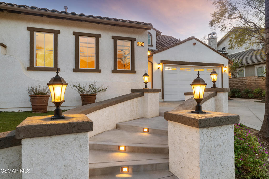 4920 Corral Street Simi Valley, CA 93063 - Photo 6 of 54 a living room with furniture and a fireplace