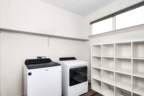 a utility room with dryer and washer