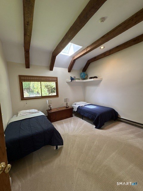 40 Looking Glass Hill Road Litchfield, CT 06750 - Photo 27 of 33 a bedroom with a bed and window