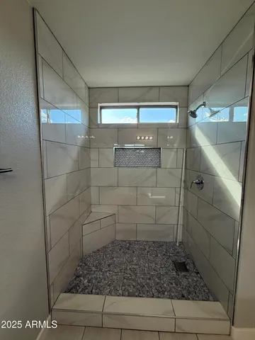 a view of a room with racks on the wall