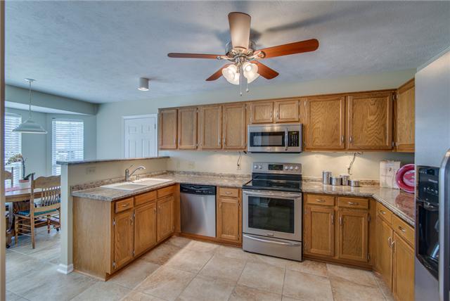 3500 Cobble Street Nashville, TN 37211 - Photo 10 of 20 New tile floor and stainless steel appliances upgrade kitchen