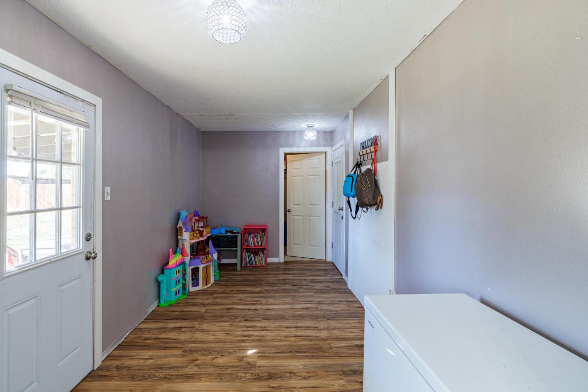 112 Maynard Street Bastrop, TX 78602 - Photo 16 of 35 Game room featuring dark wood-type flooring