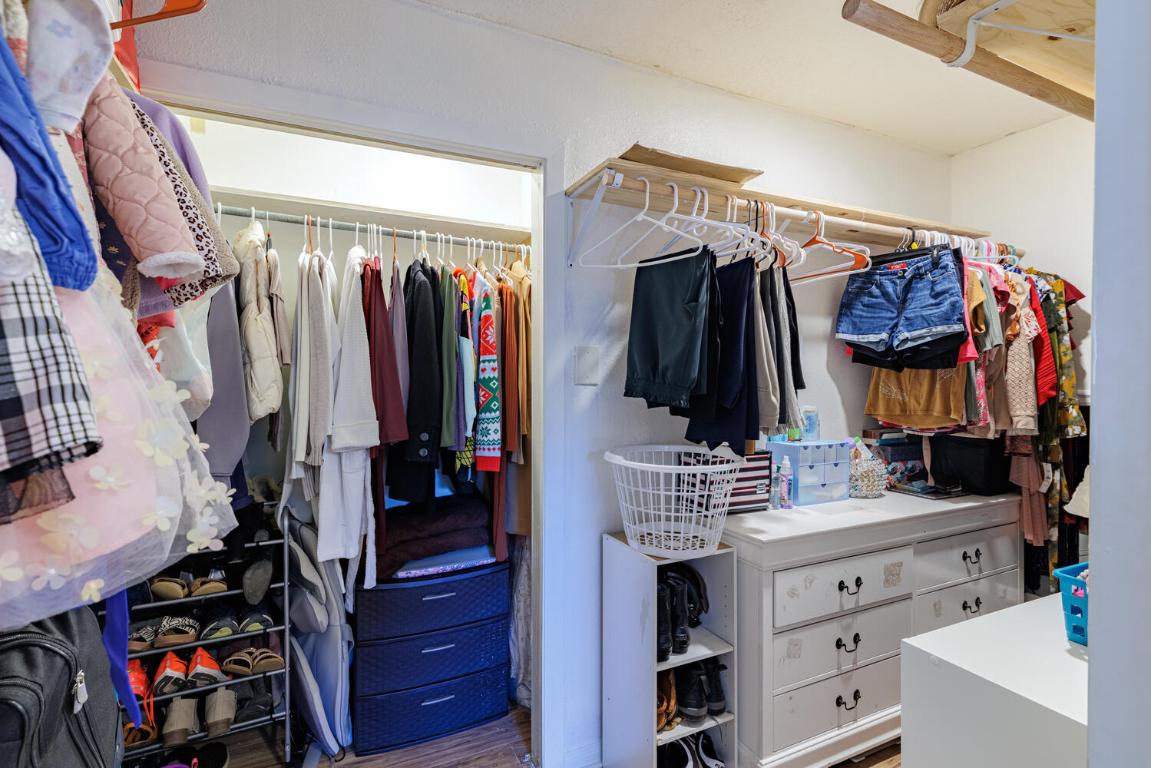 112 Maynard Street Bastrop, TX 78602 - Photo 29 of 35 Spacious closet with wood finished floors