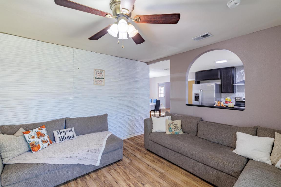 112 Maynard Street Bastrop, TX 78602 - Photo 7 of 35 Living room with light wood-style flooring and a ceiling fan