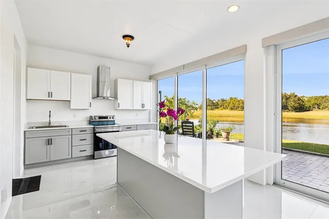 a bedroom with a bed and a night stand