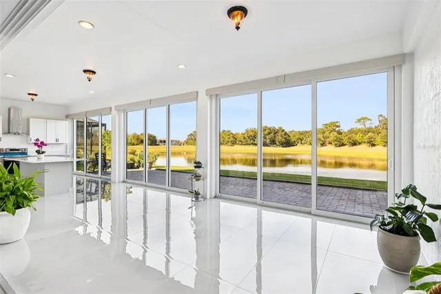 a view of a house with a yard porch and sitting area