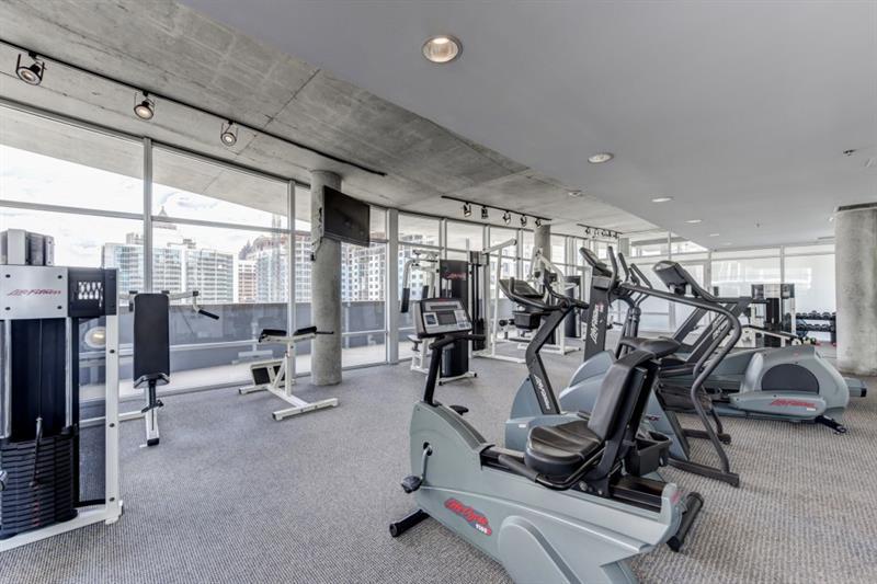845 Spring Street Northwest, Unit 522 Atlanta, GA 30308 - Photo 20 of 23 a view of a room with gym equipment
