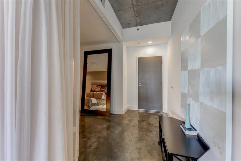 845 Spring Street Northwest, Unit 522 Atlanta, GA 30308 - Photo 2 of 23 a view of an entryway with wooden floor