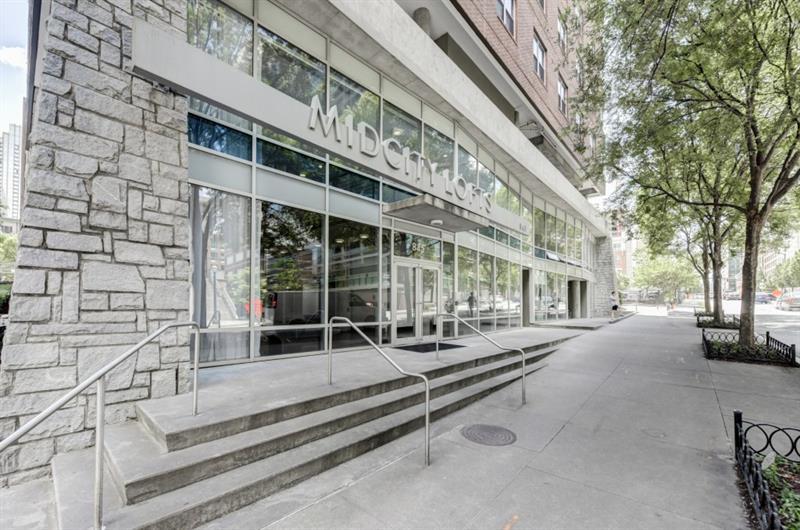 845 Spring Street Northwest, Unit 522 Atlanta, GA 30308 - Photo 23 of 23 a front view of a building with street