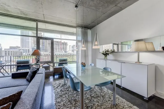 a living room with furniture and a table