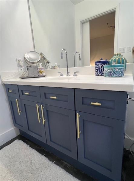845 Spring Street Northwest, Unit 522 Atlanta, GA 30308 - Photo 8 of 23 a bathroom with a sink and a mirror