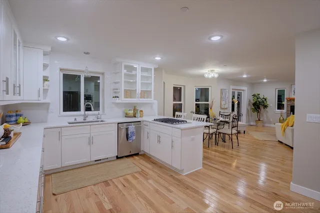 a kitchen with lots of counter top space and living room