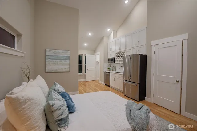 a bed room with a bed furniture and a window