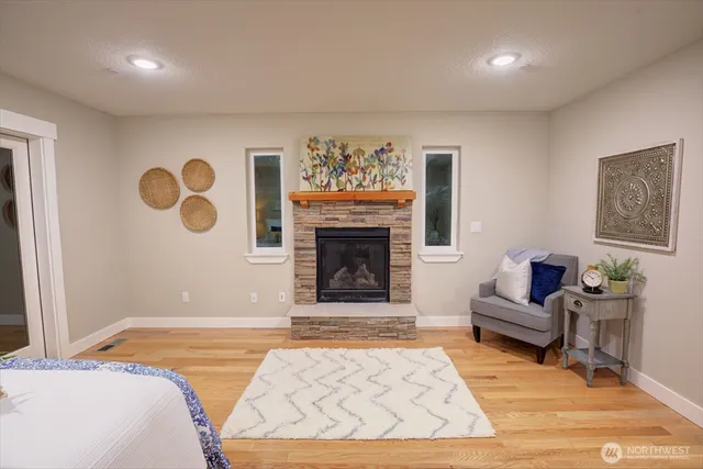 a bedroom with a bed and a couch