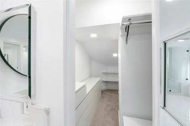 a view of a room with a hallway