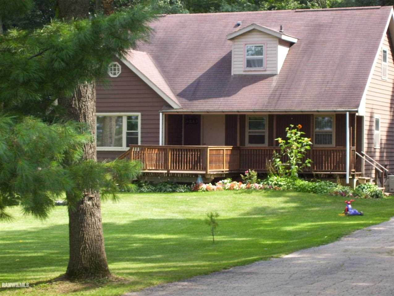17910 Yale Bridge Road Davis, IL 61019 - Photo 11 of 11 a front view of a house with garden
