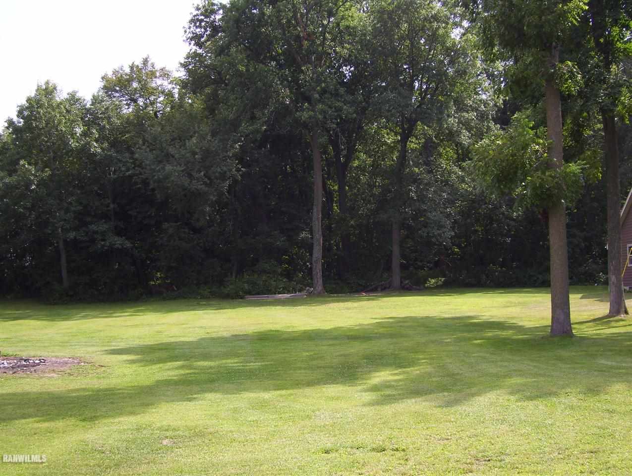 17910 Yale Bridge Road Davis, IL 61019 - Photo 6 of 11 a view of a swimming pool with a yard