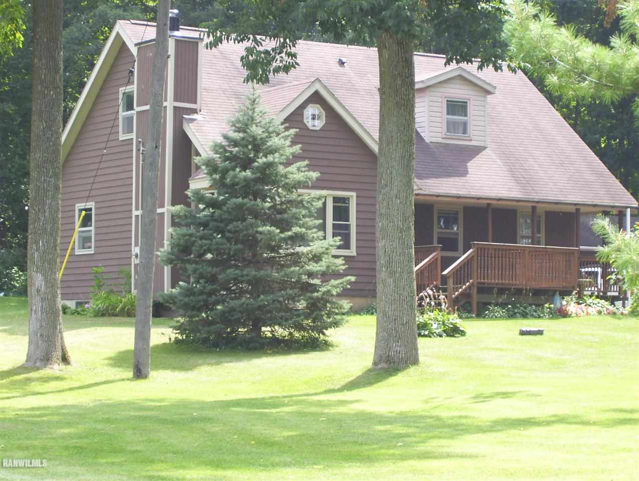 17910 Yale Bridge Road Davis, IL 61019 - Photo 8 of 11 a view of a house with backyard and sitting area