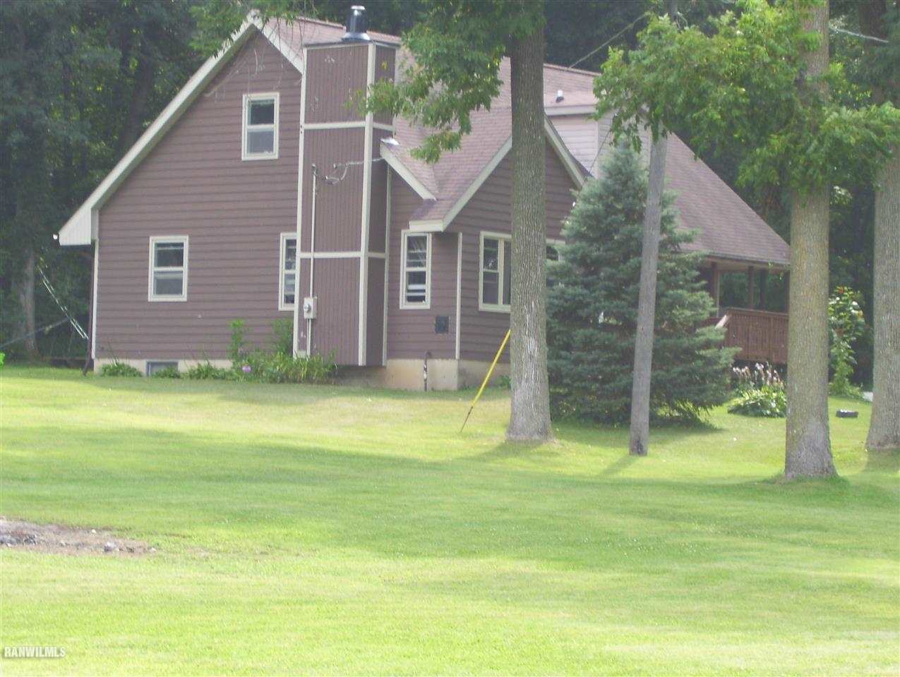 17910 Yale Bridge Road Davis, IL 61019 - Photo 9 of 11 a view of a house with a yard and a tree