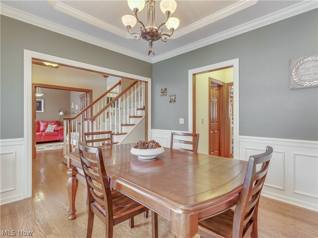 1794 Summerchase Road Northeast Canton, OH 44721 - Photo 9 of 32 Formal dining with wainscotting leading into the kitchen
