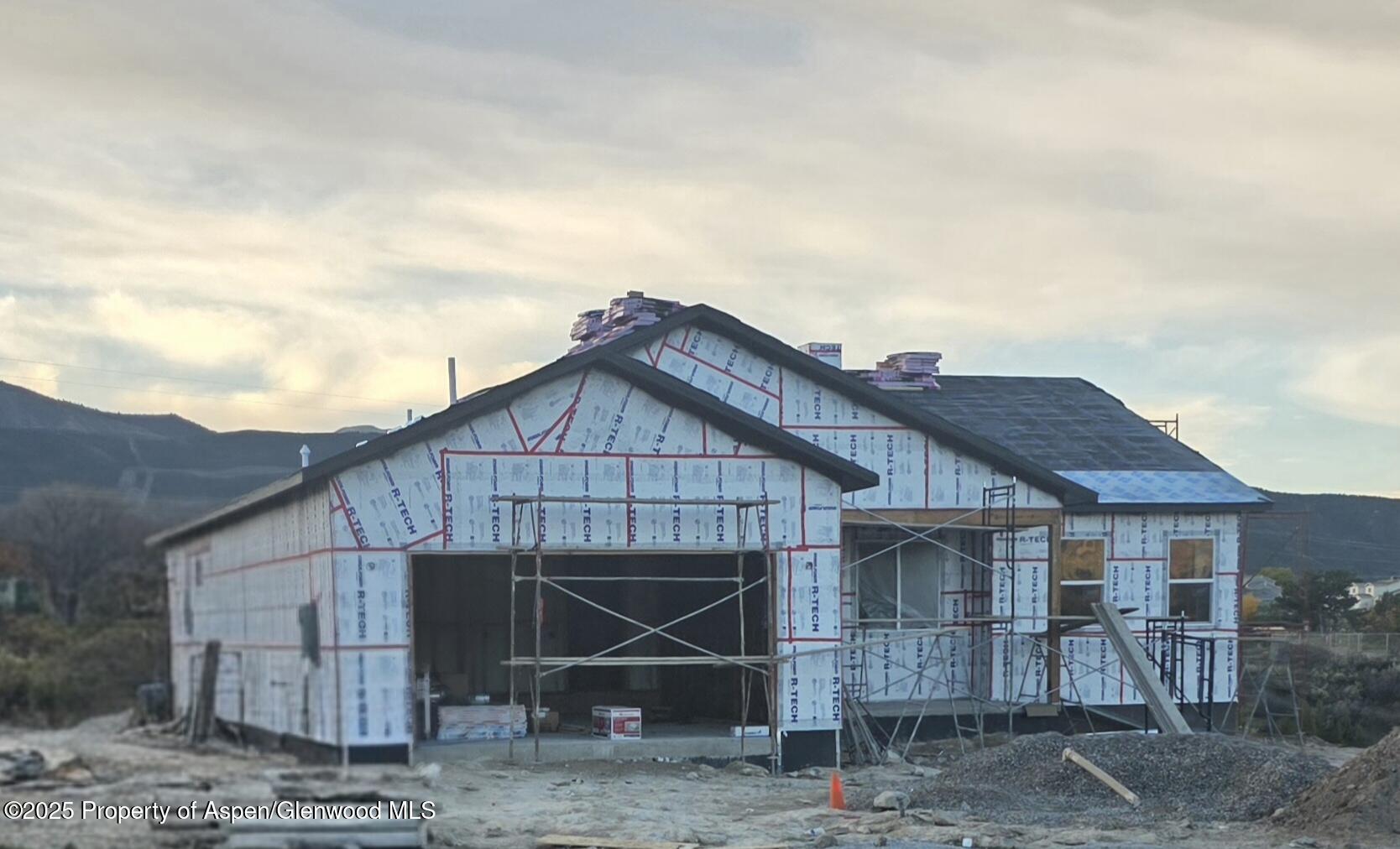 a front view of a house with parking