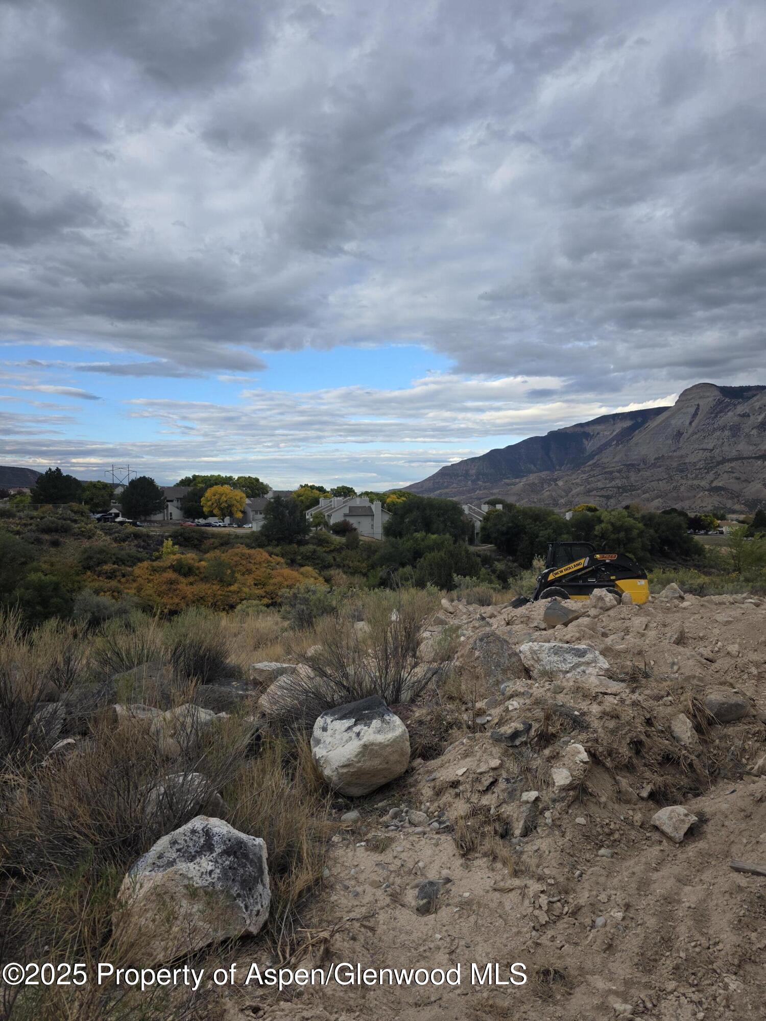 318 Eagle Ridge Drive Parachute, CO 81635 - Photo 13 of 14 a view of a lake with an outdoor space